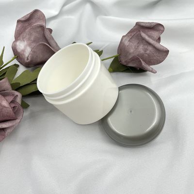 Het ronde Plastic Kosmetische Vastgestelde 50g de Containers van de Kruikenreis Hete stempelen met Verschillend Patroon